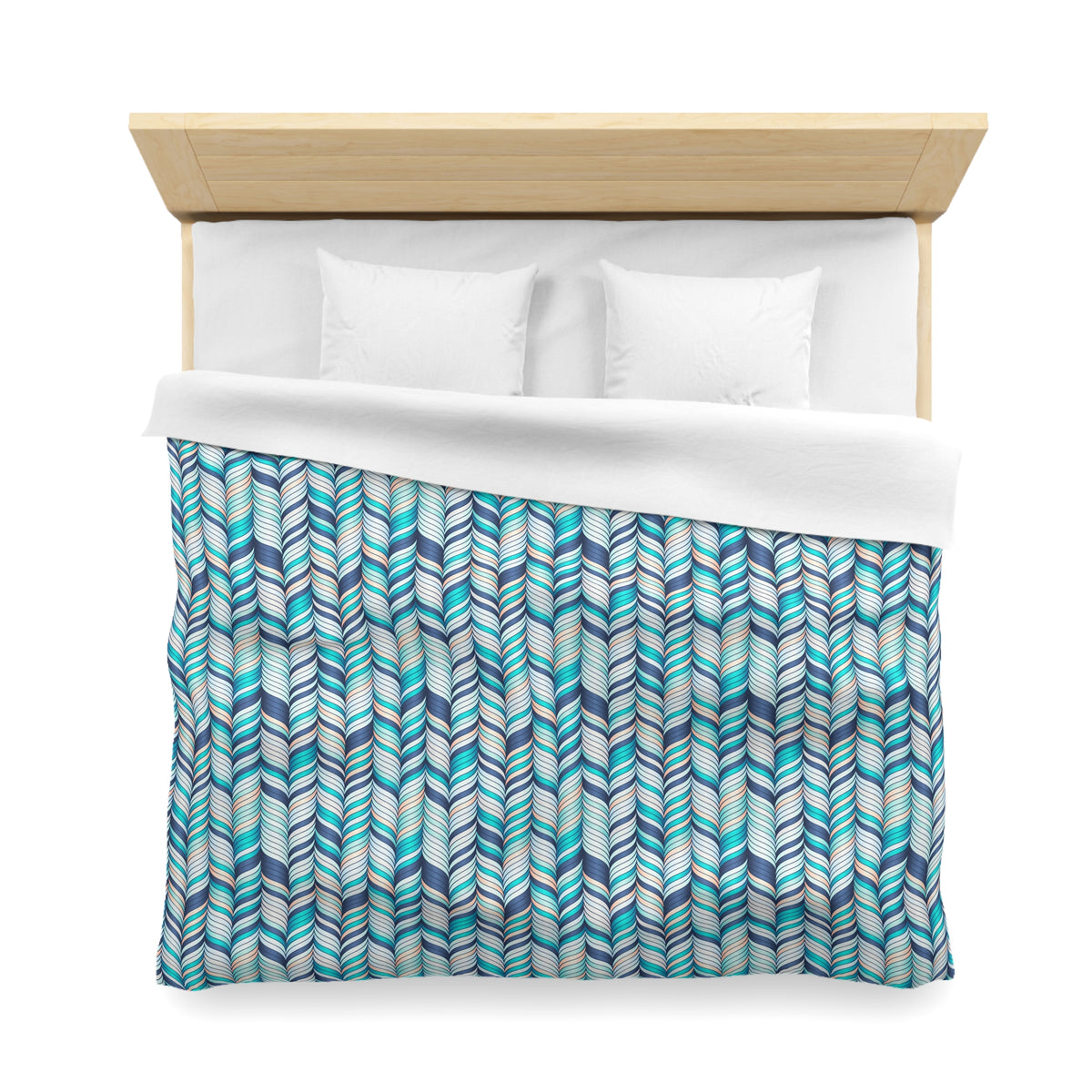 a neatly made bed with a blue and white patterned comforter and two white pillows.