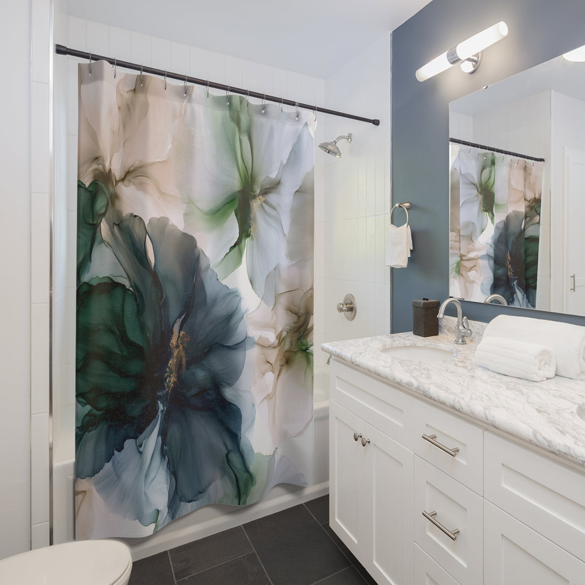 a bathroom with a floral shower curtain and a toilet