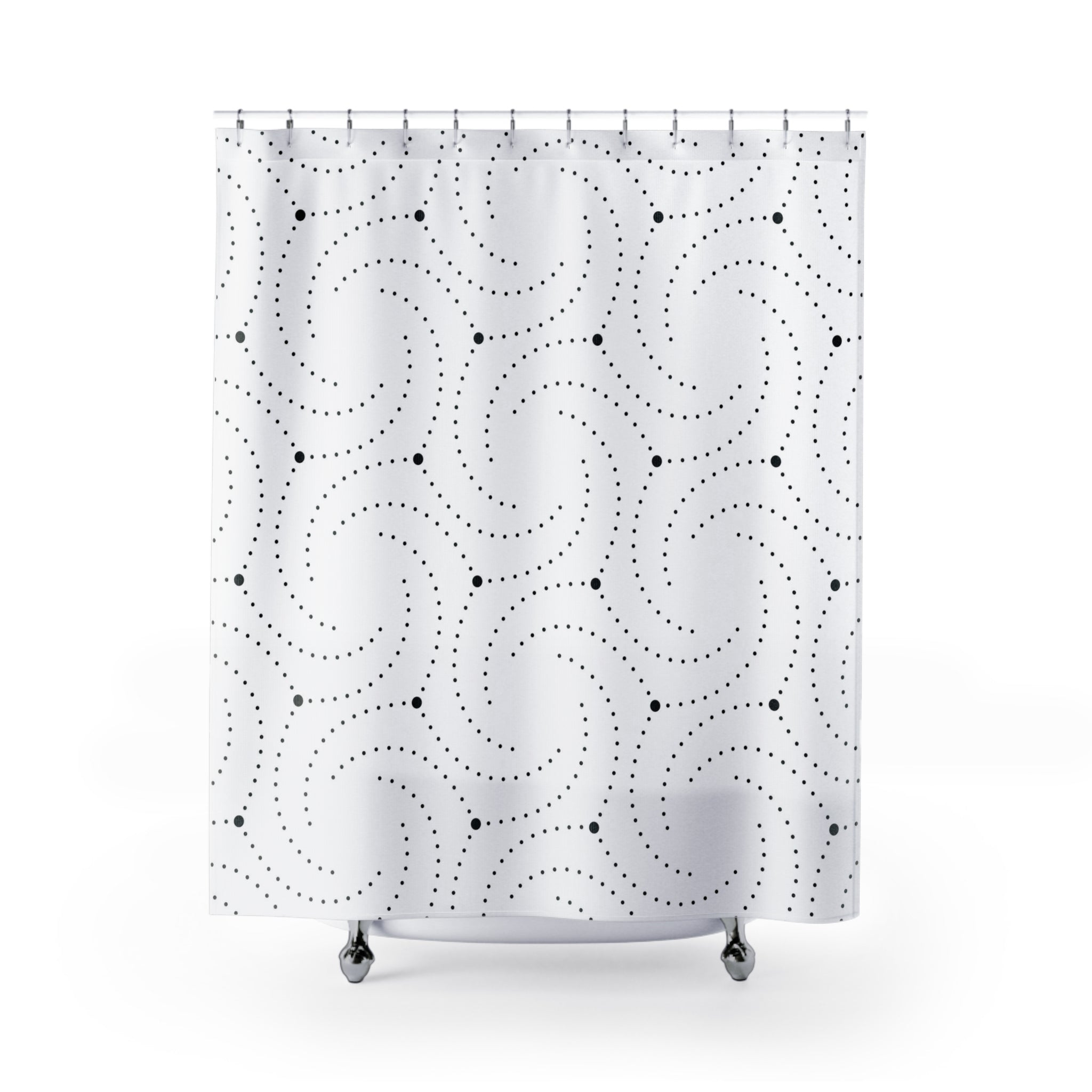 a white shower curtain with black dots on it