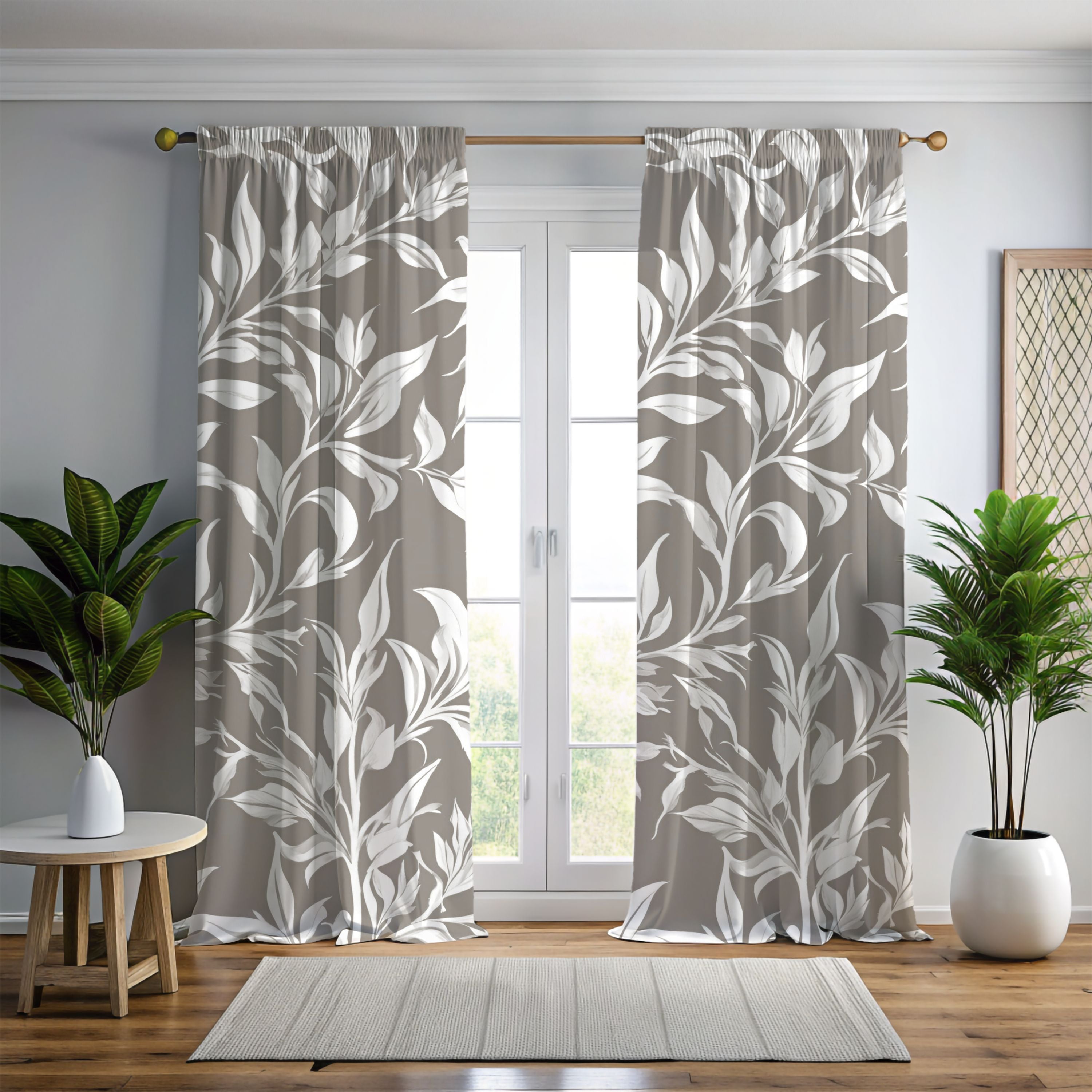 a living room with a large window covered in curtains