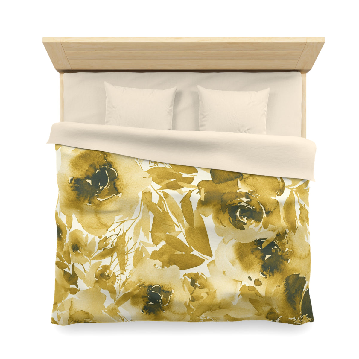 a bed with a floral print duvet cover and pillows.