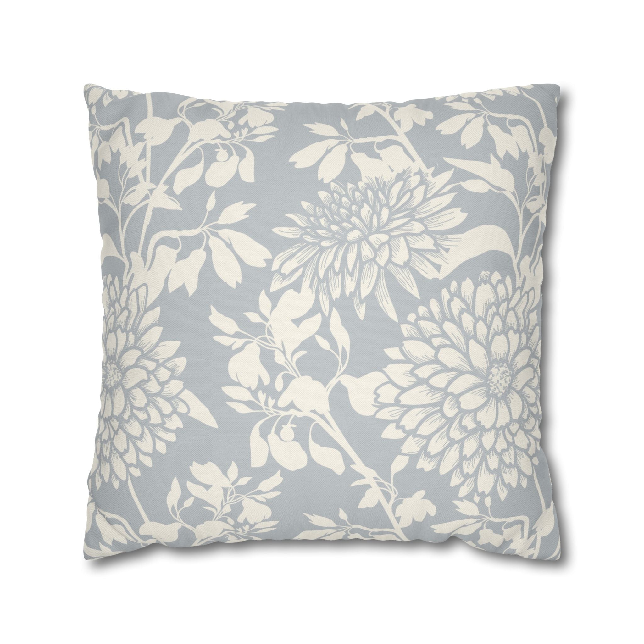 A square throw pillow with a gray and white floral pattern.