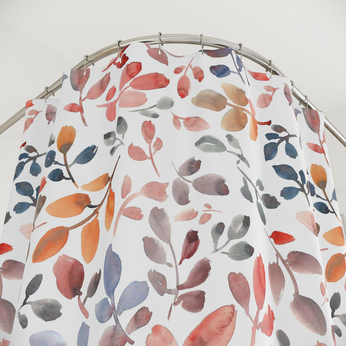 a shower curtain with a vibrant, colorful leaf pattern.