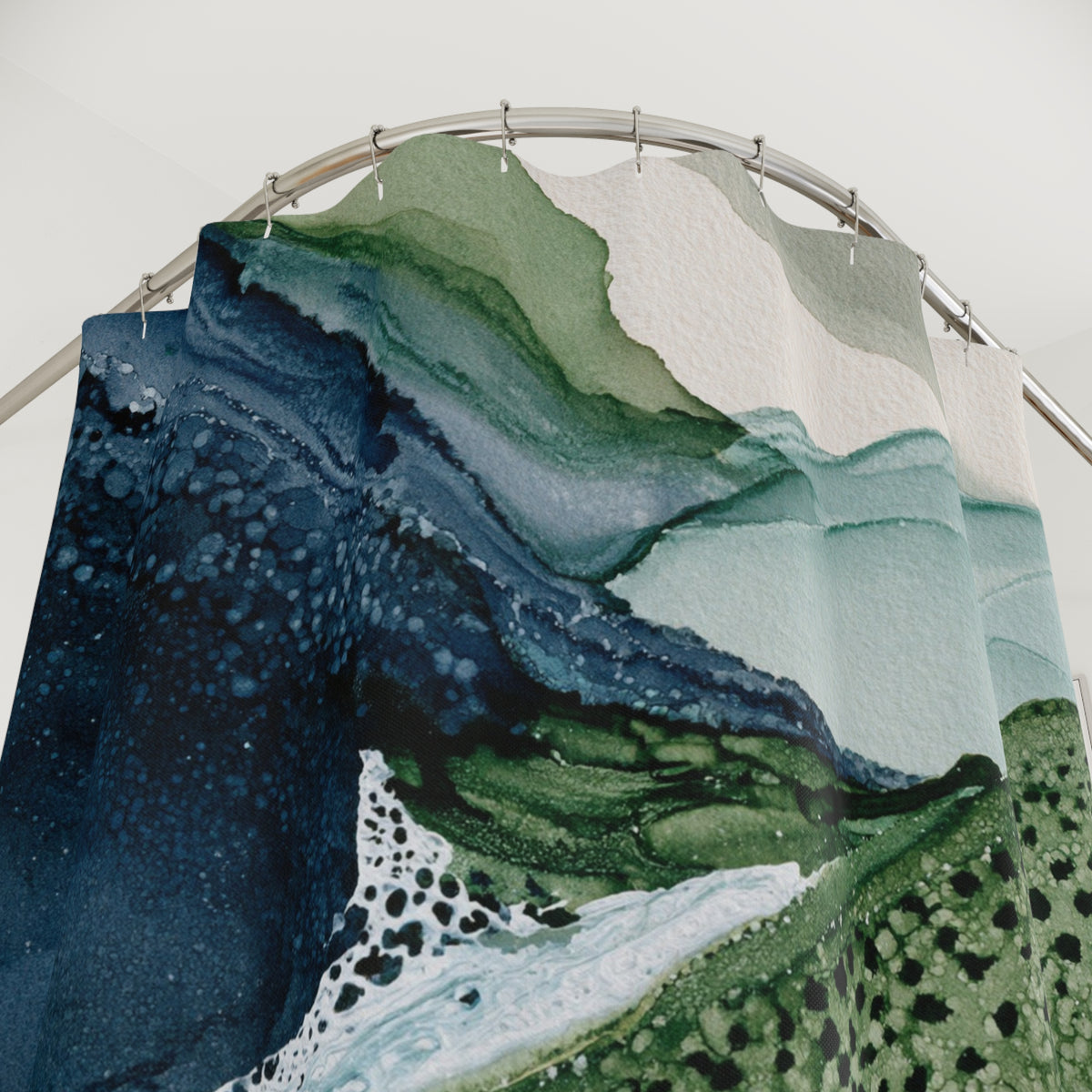 a shower curtain with a watercolor-style mountain landscape design.