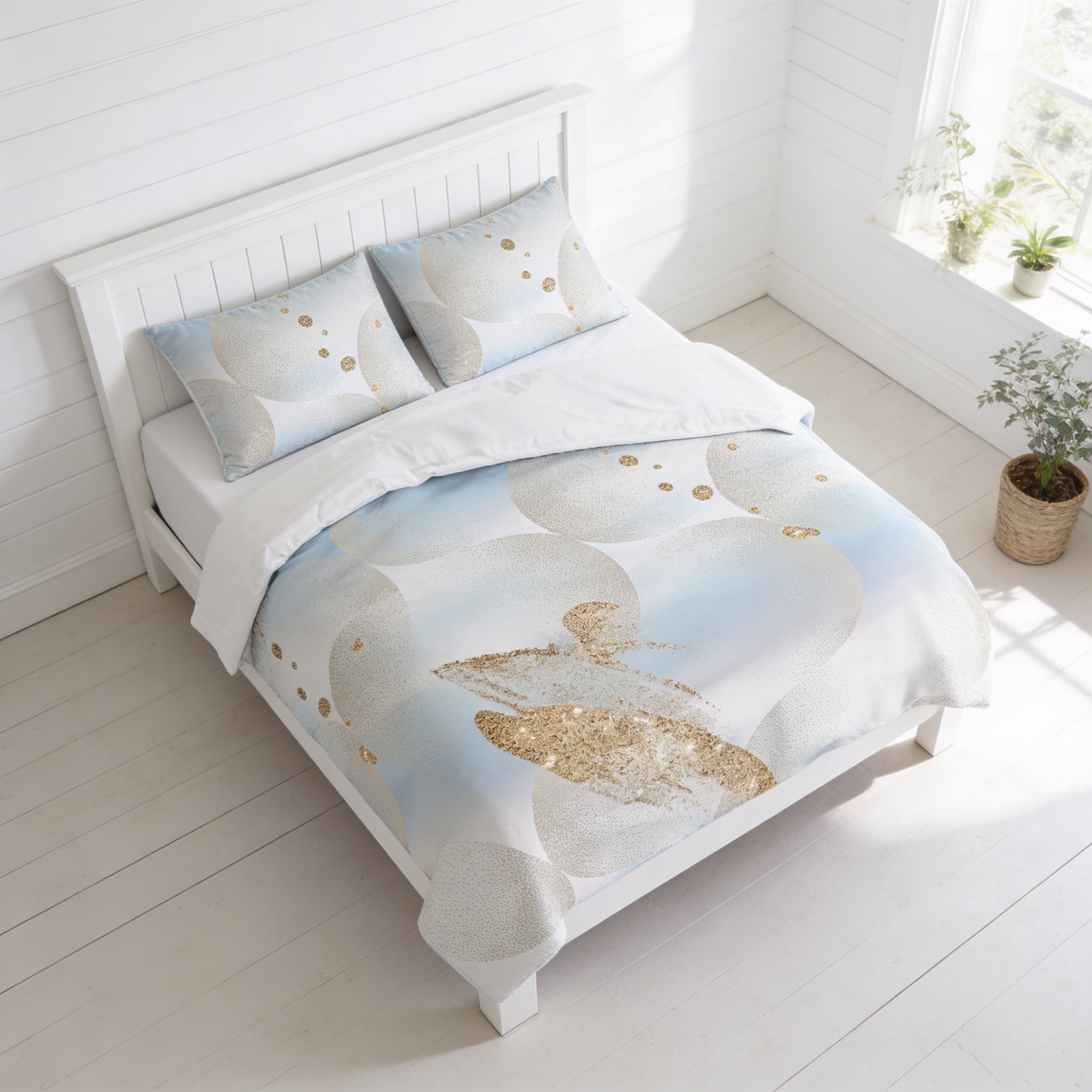 a white wooden bed with a blue and gold patterned comforter and pillows, placed in a bright, white-walled room with a window and a potted plant.