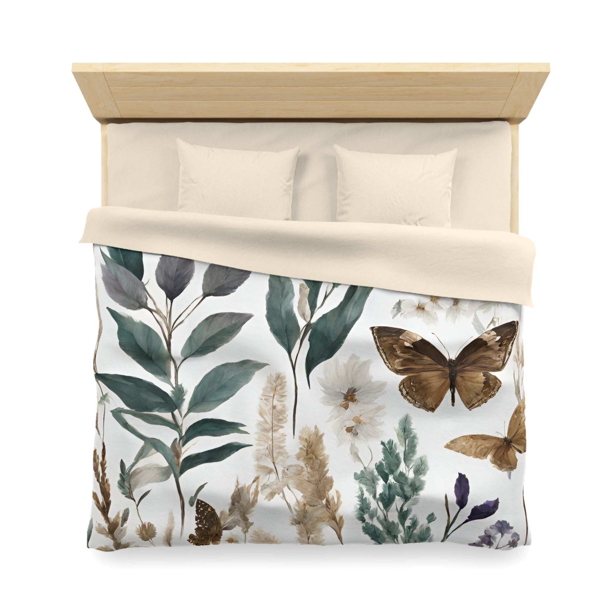 a bed with a white comforter and a printed design featuring various plants, flowers, and butterflies.