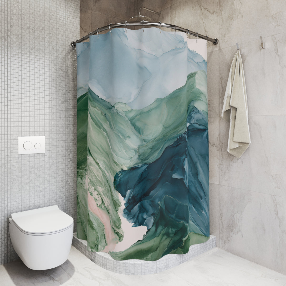 a bathroom with a shower curtain that has a mountain landscape design. The shower curtain is hanging on a rod next to a towel. The bathroom has a white toilet and a tiled wall.