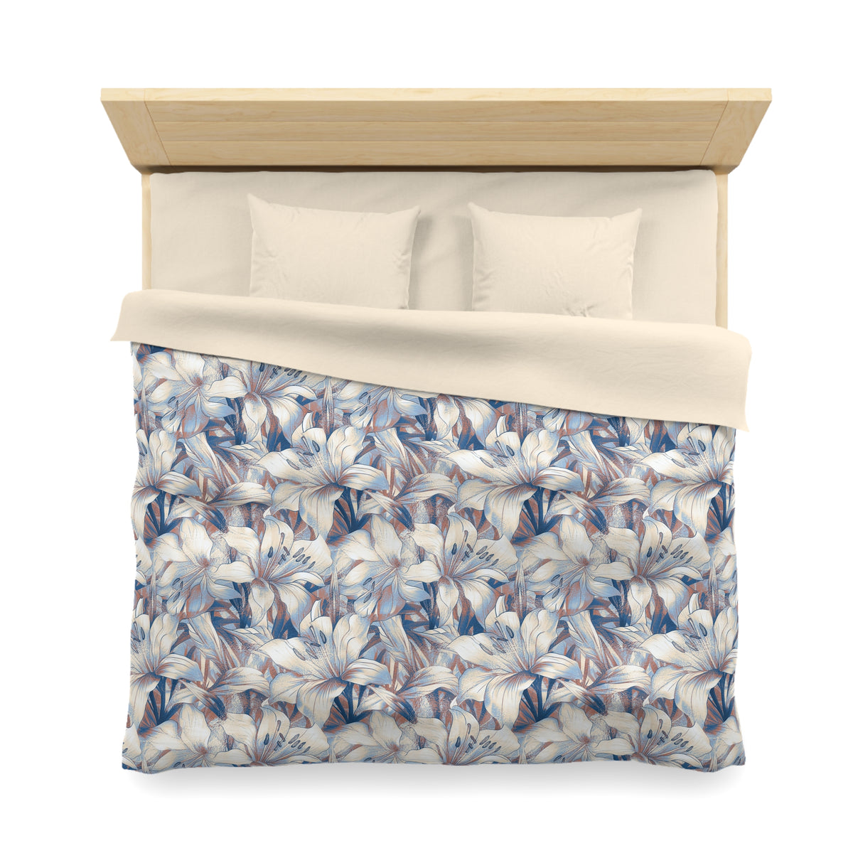 a neatly made bed with a floral patterned comforter and pillows.