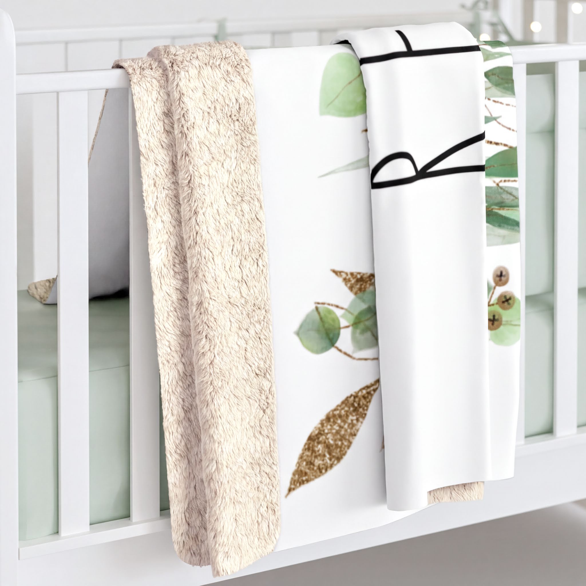 Rae Dunn Inspired RELAX Eucalyptus Leaves Blanket draped on a sofa