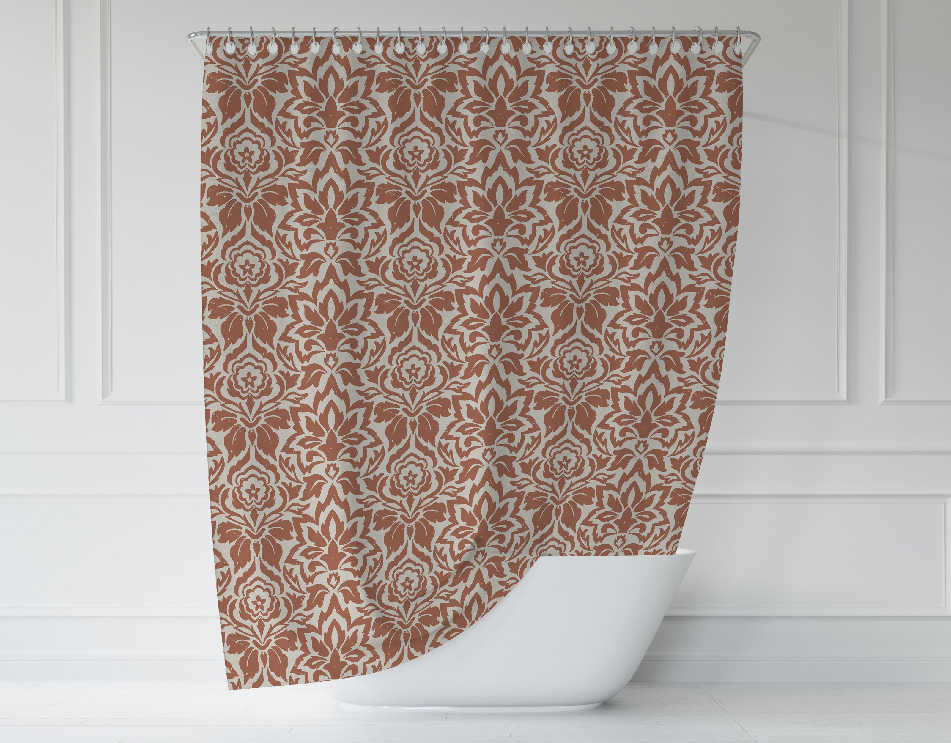 a brown and white shower curtain hanging on a wall