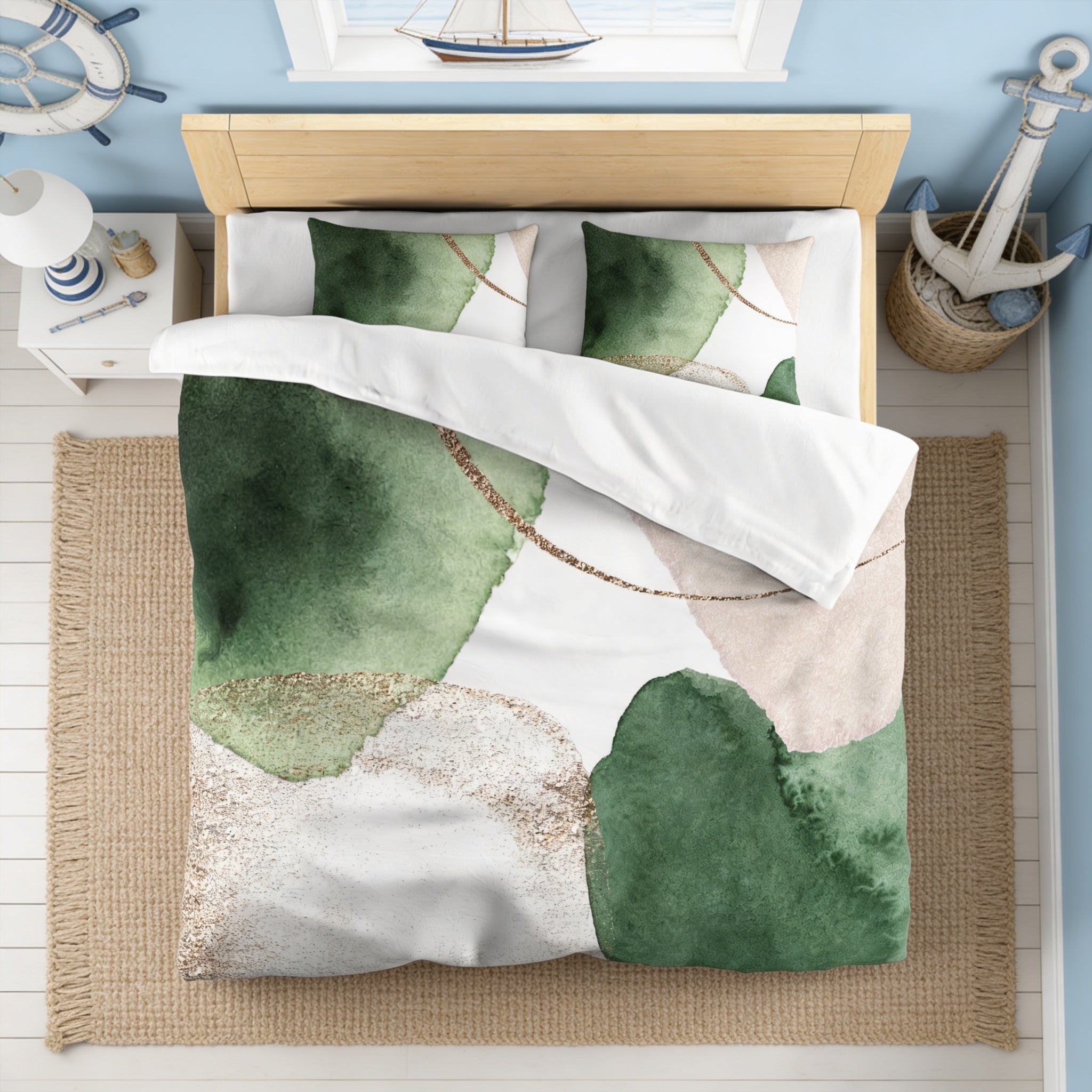 a bedroom with a bed covered in a green and white patterned comforter and pillows. The bed is positioned against a wall with a window, and there is a nightstand next to it. The room also features a rug on the floor and a small boat decoration on the wall.