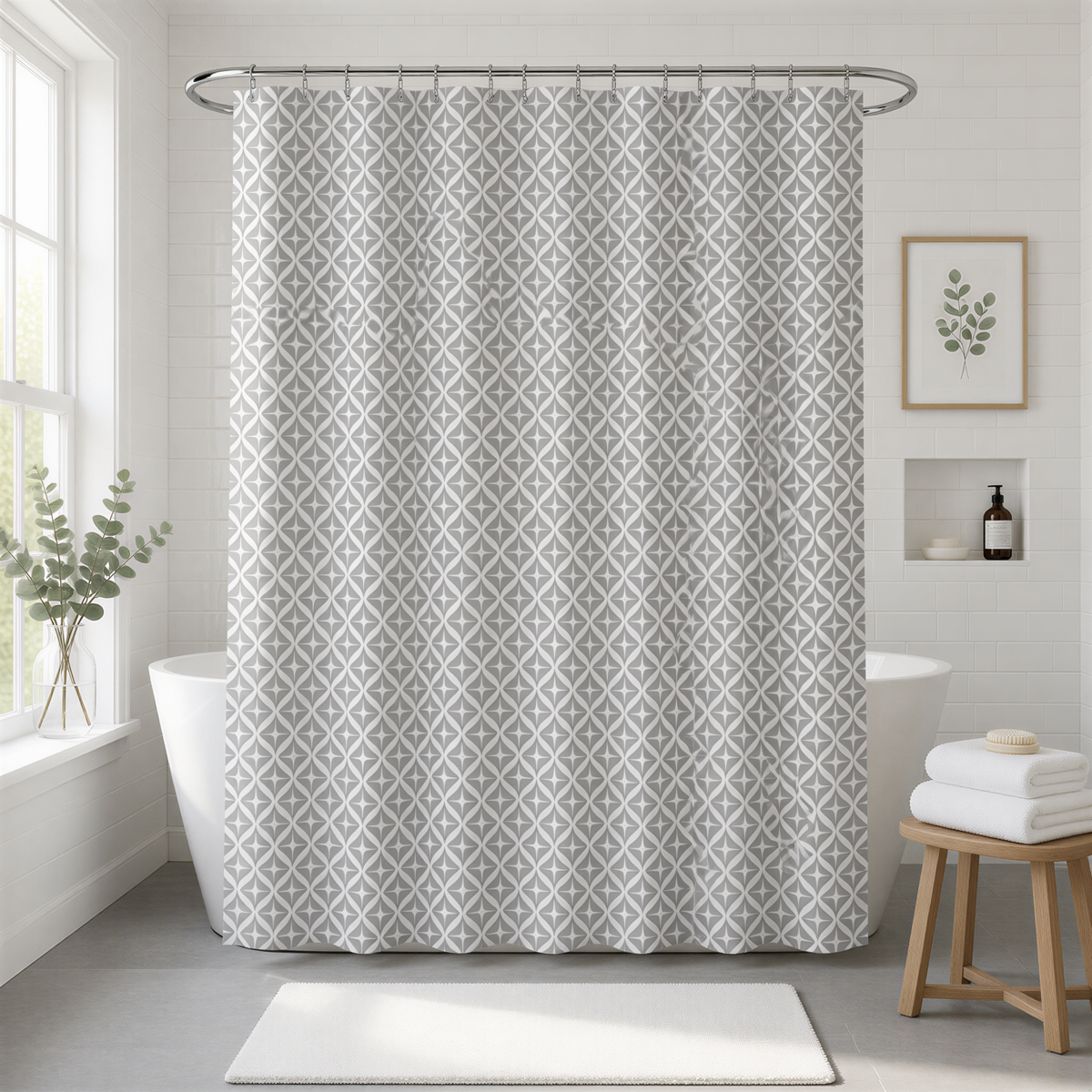 a modern bathroom with a white bathtub, a shower curtain with a geometric pattern, and a wooden stool.