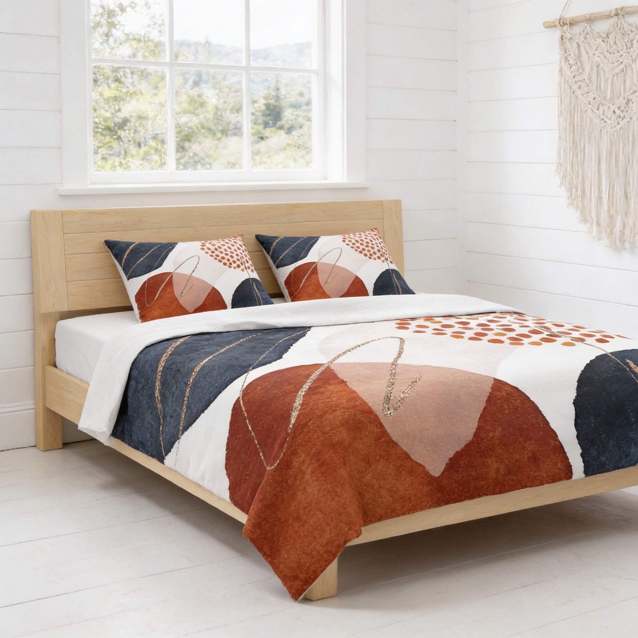 a modern bedroom with a wooden bed frame and a colorful abstract bedding set. The bed is positioned against a white wall, and there is a window in the background.