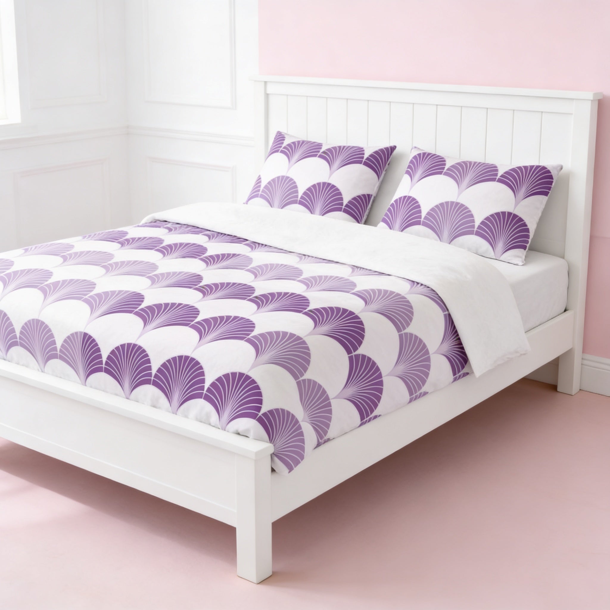 a white wooden bed with a purple and white comforter featuring a repeating pattern of seashells or waves. The bed is set against a pink wall, creating a visually appealing contrast.
