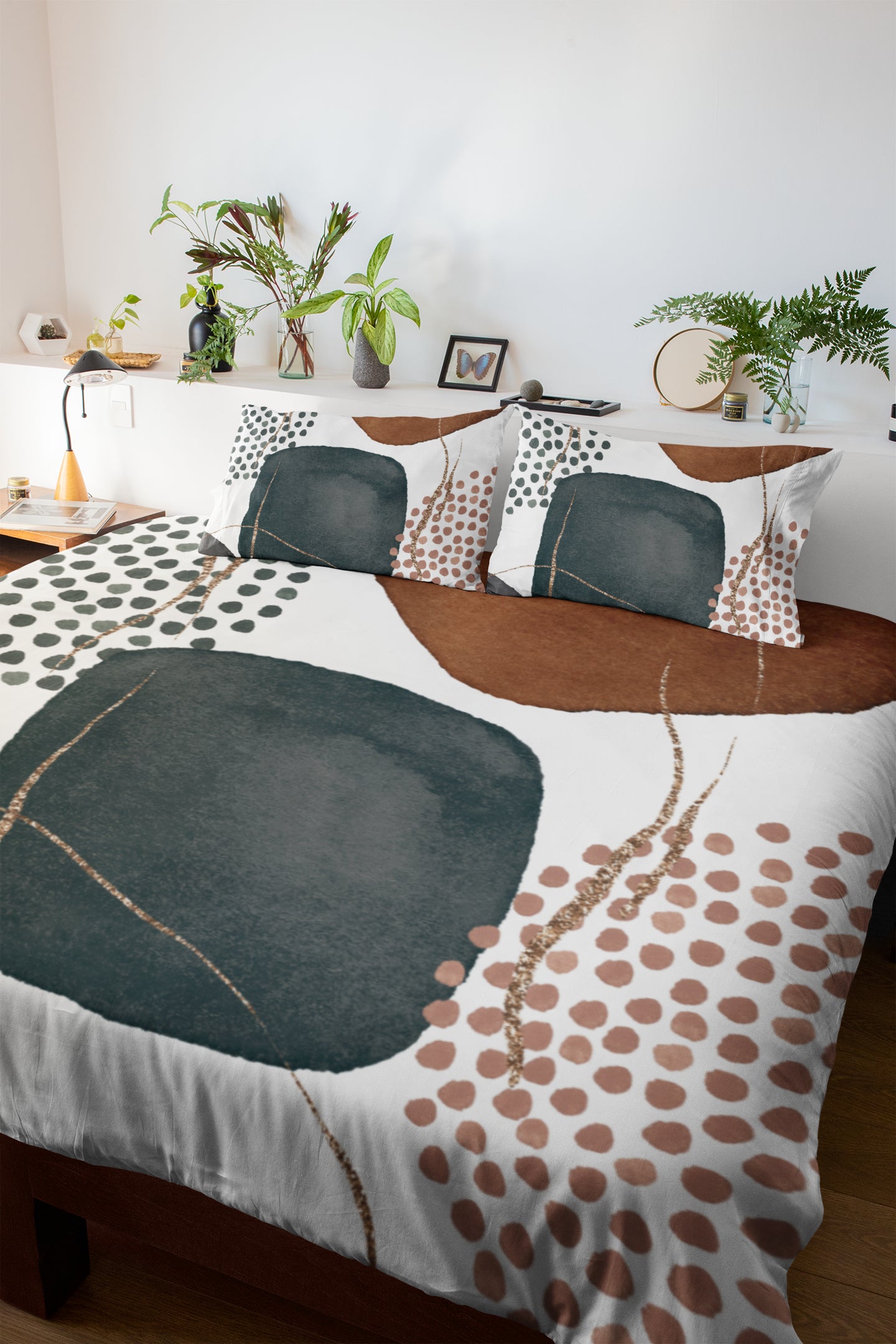 a bed covered in a white and brown comforter