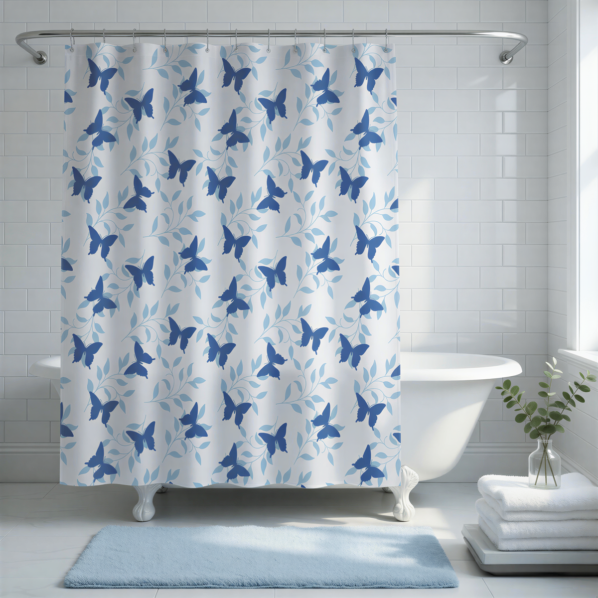 a bathroom with a white bathtub, a blue and white patterned shower curtain, and a stack of white towels.