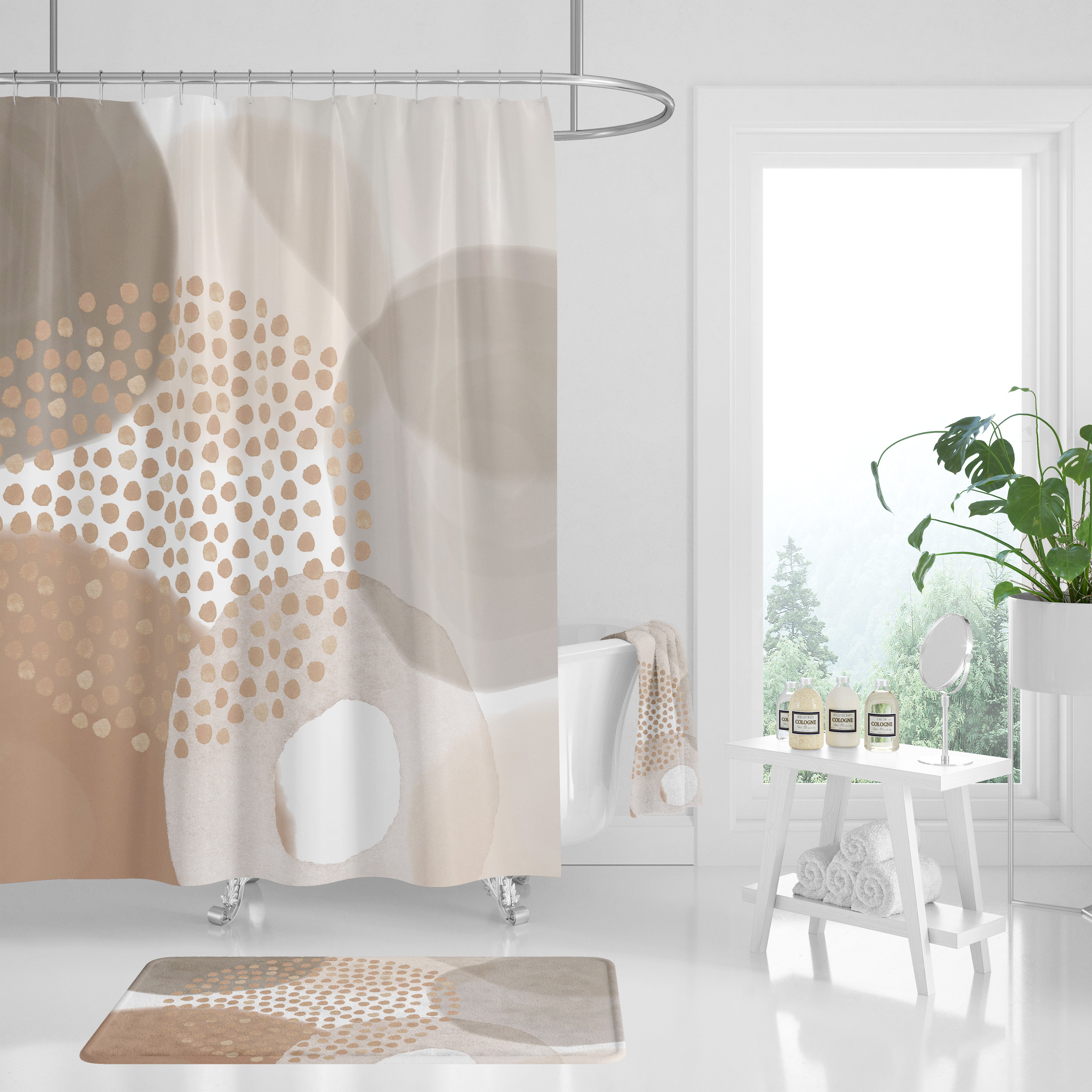 a bathroom with a shower curtain and a potted plant