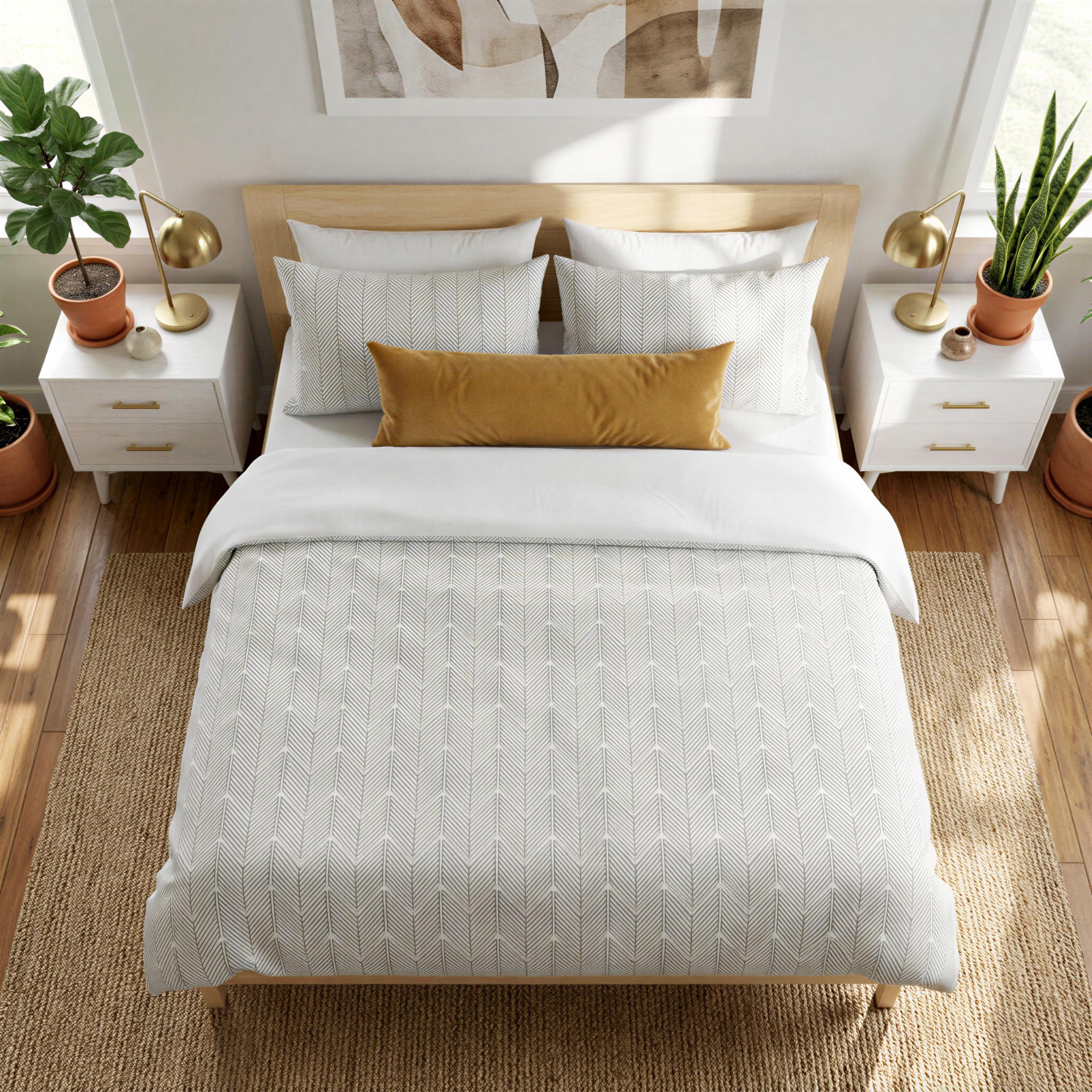 a well-decorated bedroom with a large bed, white bedding, and a wooden headboard. The room has a neutral color scheme with white walls and a beige rug. There are two nightstands on either side of the bed, each with a lamp and a plant. The overall layout and design of the room create a cozy and inviting atmosphere.